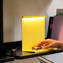 HAY LBM LED Table Lamp Titanium Yellow on Shelf