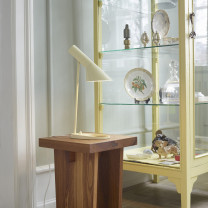 Louis Poulsen AJ Table Mini Lamp Soft Lemon on Side Table