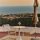 HAY Mousqueton Portable Lamp Stainless Steel on Balcony