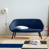 HAY Matin Wall Light White Beside Sofa