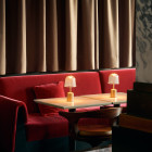 Nuura Asteea LED Portable Lamp in Restaurant