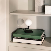 Black Phol Mobil Table Lamp on Shelf