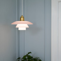 Louis Poulsen PH 3½/3 Pale Rose Brass Pendant in living room