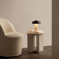 Audo Copenhagen Reverse Portable Table Lamp on Coffee Table