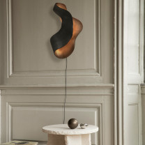 Ferm Living Oyster Wall Light Above Side Table