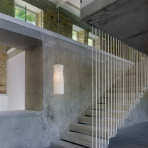 a-emotional light Gea Pendant on staircase