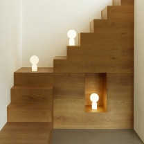 Normann Copenhagen Yo Table Lamp on staircase
