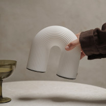 Vuelta LED Portable Lamp being moved