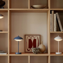 Fritz Hansen Clam LED Portable Lamp Lifestyle Shelving