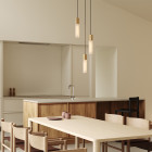 Brass Tala Basalt Triple Pendant in Dining Room