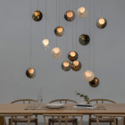 Bocci 28 Series Chandelier Over Dining Table