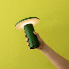 Artemide Takku LED Portable Table Lamp Lifestyle Handheld