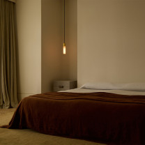 Brass Tala Basalt Pendant in Bedroom