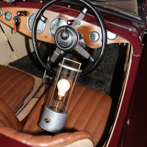 Tala The Rugged Muse Outdoors in a Car