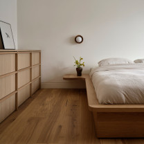 Hollis + Morris Berm Orb LED Sconce in Bedroom