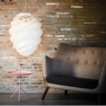 Le Klint Swirl 2 Pendant Light Large White Above Sofa
