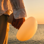 Gubi Obello LED Portable Table Lamp Lifestyle Handheld