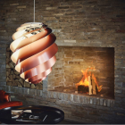 Le Klint Swirl 2 Pendant Light Copper by Fireplace