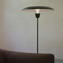 New Works Kantarell Floor Lamp Black Behind Sofa