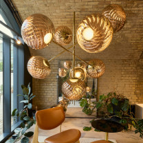 Tom Dixon Whirl Chandelier Gold in Situ