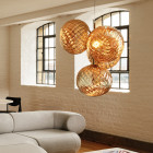 Tom Dixon Whirl Chandelier Gold Above Sofa